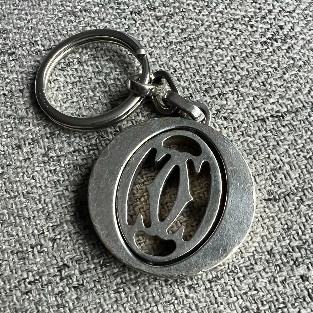 Cartier Silvertone stainless steel pivoting Double C key ring